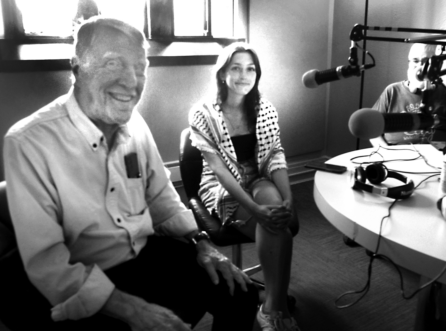 PHOTO: Encampment spokesperson Erin Mackey in-studio with hosts Phil Taylor and Phil Conlon.